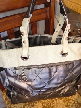 Chanel Large Tote Gunmetal Gray Coated Canvas w/Silver-Tone Hardware Cream Trim.